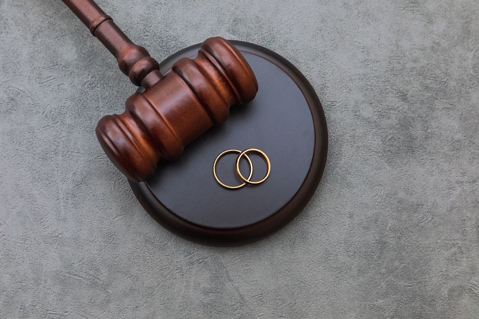 Gavel with wedding bands